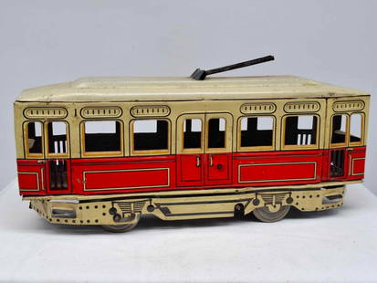 German Tin Toy Trolly Wind-Up: this is a very neat old German Trolly, it is about 12 inches long, working no key