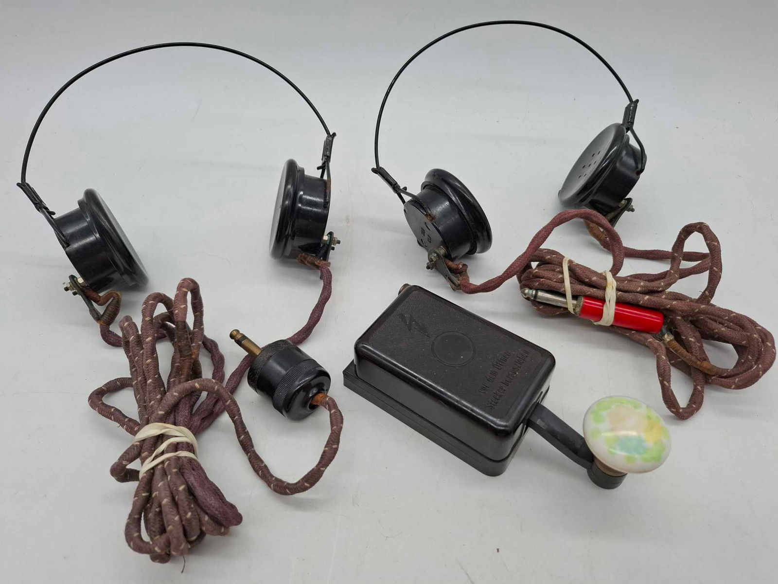 Bakelite Telegraph Key & Headsets WW 2 German: Telegraph Key and 2 headsets, made of Bakelite, no cracks or damage, appear to be complete
