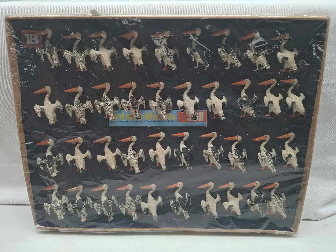 Unsold Store Stock - Pelican Britains Zoo Series "New for 1969" Original Dealer Card: A highly desirable piece of vintage toy history: an original dealer card from Britains’ Zoo Series, marked “New for 1969,” featuring 49 lead pelicans still securely tied in place. The card r