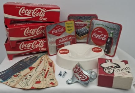 Vintage Coca-Cola Collectibles Group: A charming and visually appealing group of vintage Coca-Cola collectibles, offering a well-rounded mix of advertising pieces spanning mid-20th century design and nostalgia. The lot includes a set of