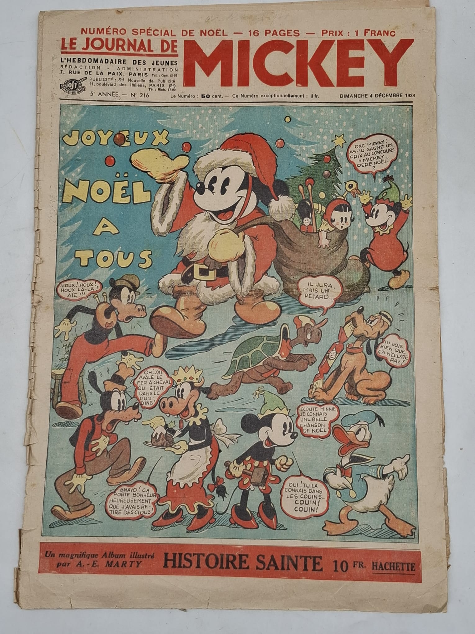 1938 French Mickey Mouse Christmas Comic (Golden Age): A scarce and highly appealing Golden Age Mickey Mouse comic paper from 1938, issued in France as a special Christmas publication. This charming piece captures the early international popularity of Mic
