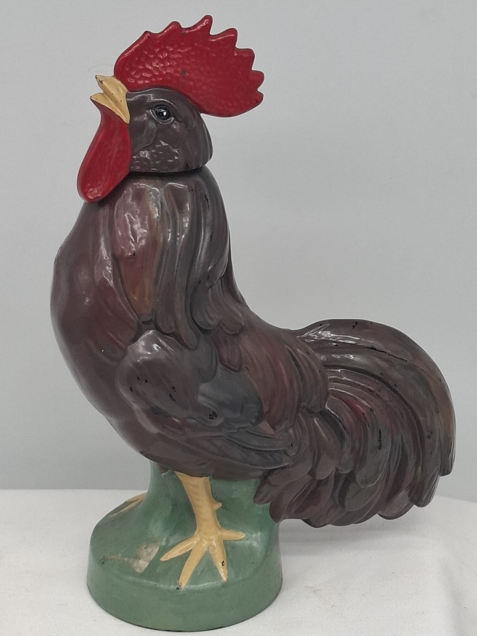 Mid-20th Century French Rooster Form Decanter – Hand-Painted Glass: A charming and finely crafted mid-20th century glass decanter in the form of a rooster, standing approximately 10 1/2 inches tall. This piece is marked “Made in France” on the underside,