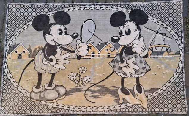 Disney Mickey & Minnie Mouse Play Mat – Paddle ball Scene, c. 1940s: harming vintage Disney play mat featuring Mickey Mouse and Minnie Mouse in a delightful “jokari” play scene. Likely dating to the circa 1940s period, this piece showcases the beloved early “