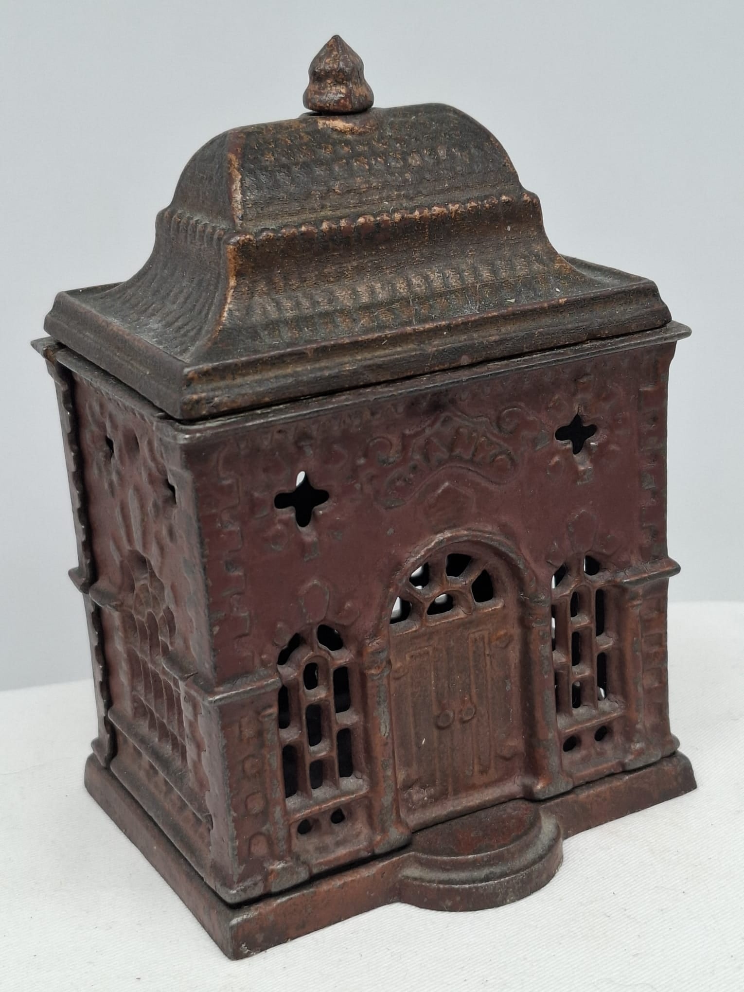 Antique Cast Iron Puzzle Building Bank – Original Paint – Circa 1870 – 6 Inches Tall: A rare and fascinating antique cast iron building bank, dating to circa 1870, This intricately cast bank comes apart when the center pin is removed, revealing its hidden interior and adding an interac