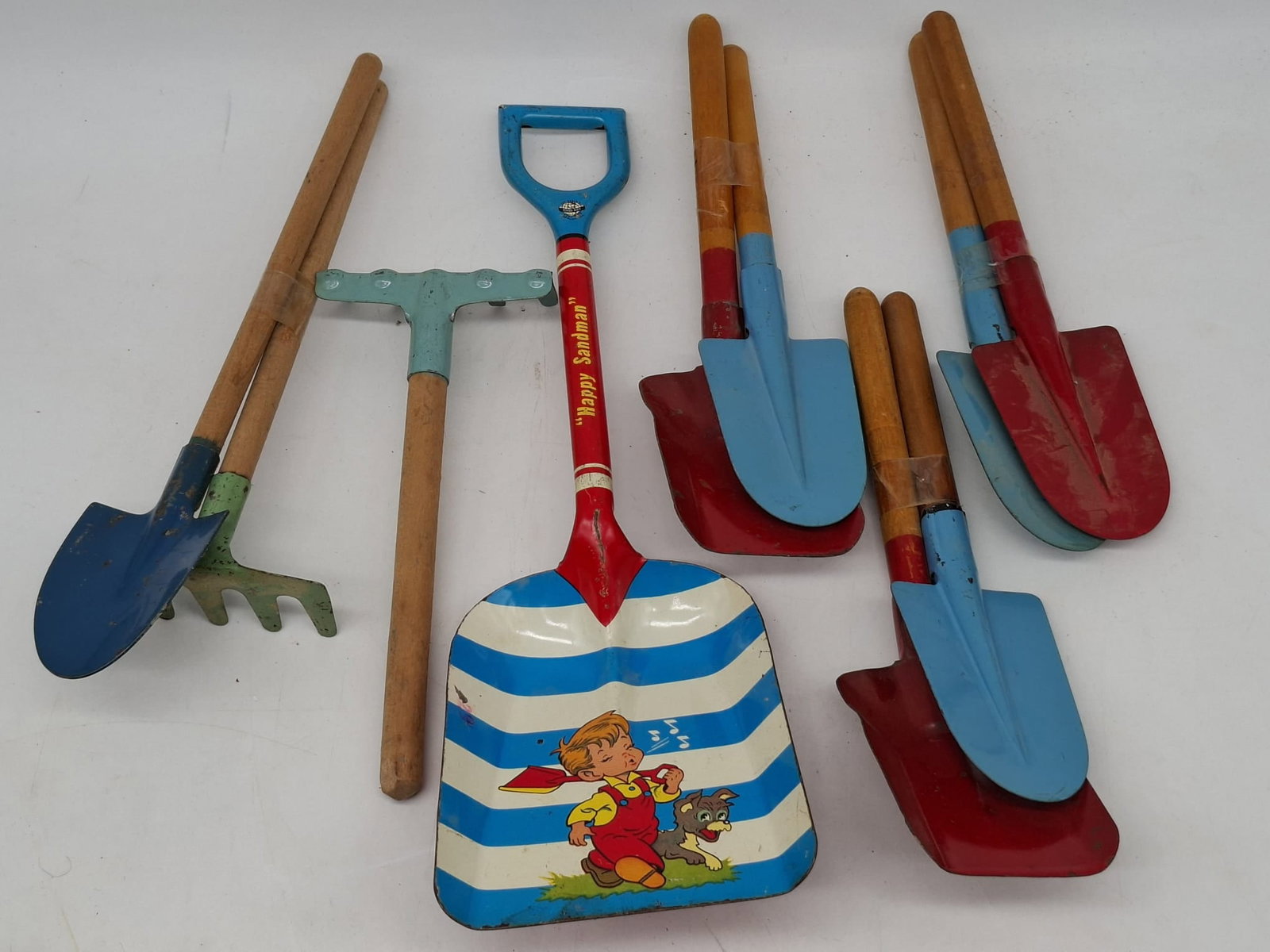 Vintage Tin Sand Toy Lot – Shovels & Rakes Including Ohio Art “Happy Sandman” Lithographed (1 of 4)