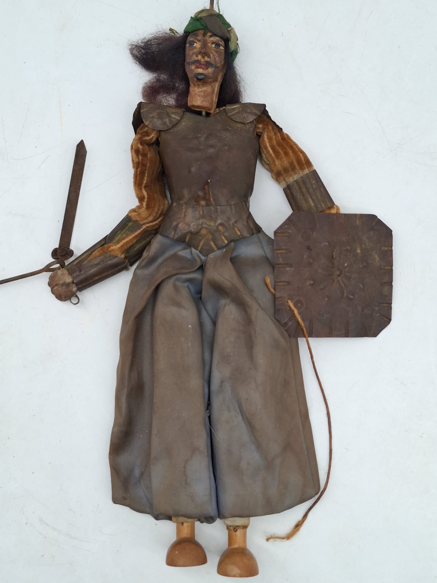 Rare Antique Italian Rod Puppet – All Original with Sword & Shield, Painted Face: A rare and evocative antique rod puppet from Italy, dating to the late 19th or early 20th century. This engaging figure is presented in all-original condition and retains its classic theatrical charac