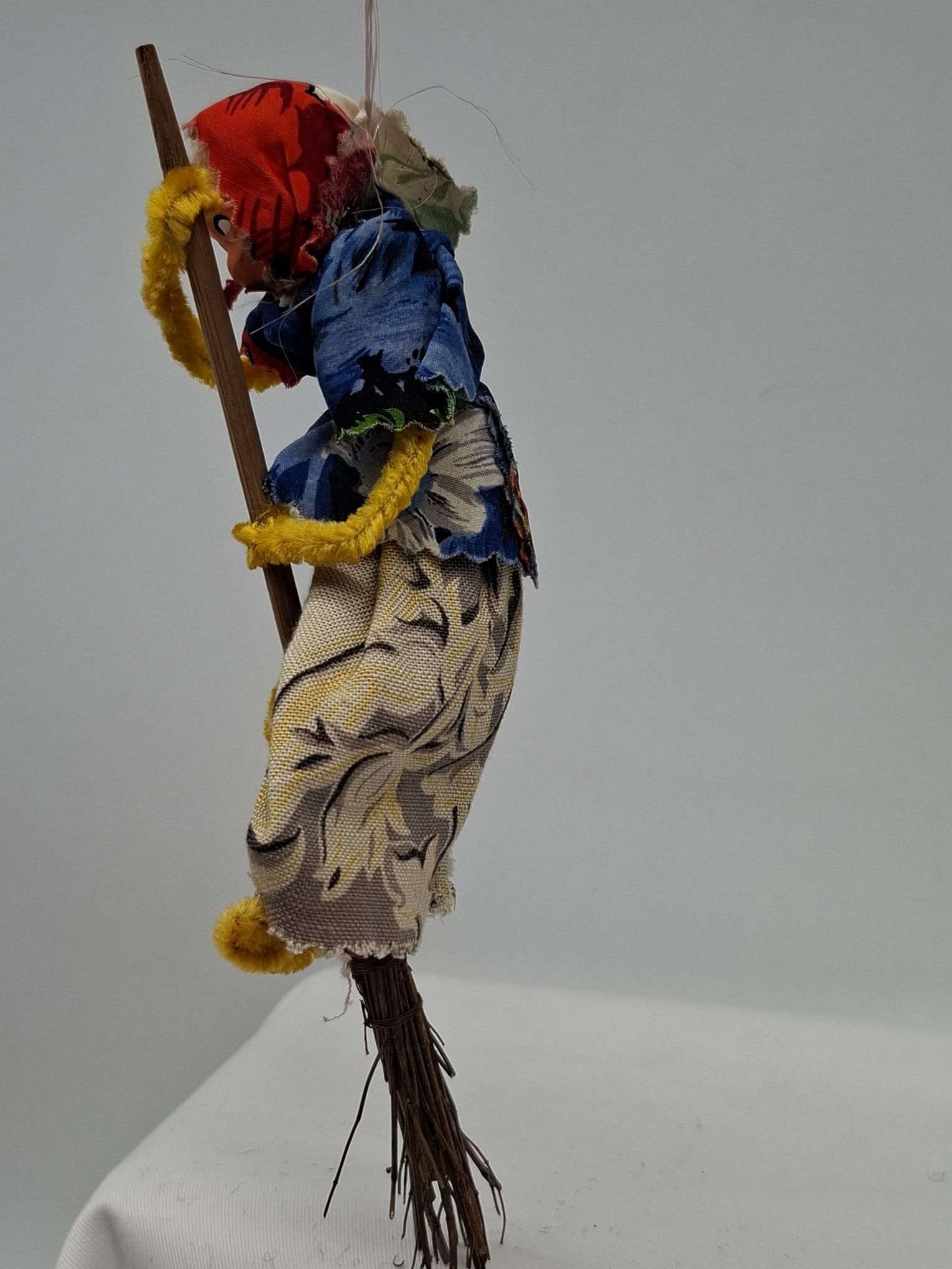 Mid-20th Century Halloween Witch on Broom – Large Figural Decoration: A wonderfully dynamic mid-20th century Halloween decoration depicting a witch in flight on her broom. Measuring approximately 9 inches overall, this is a larger and particularly well-made example, off