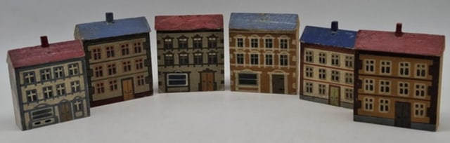 Collection of 19th Century Erzgebirge Hand-Painted Miniature Village Houses: harming collection of 19th century Erzgebirge miniature village buildings, including several hand-painted houses and an architectural town gate. Crafted in the Erzgebirge region of Germany, these whim