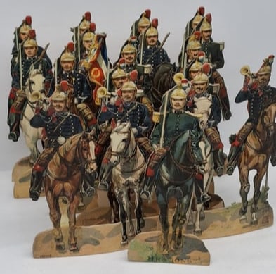 Rare 19th Century French Chromolithographed Expandable Paper Toy Soldiers by E. & Cie: A rare and fascinating group of 19th century French chromolithographed paper toy soldiers produced by E. & Cie, beautifully printed in vivid period color and designed as expandable or articulated pape