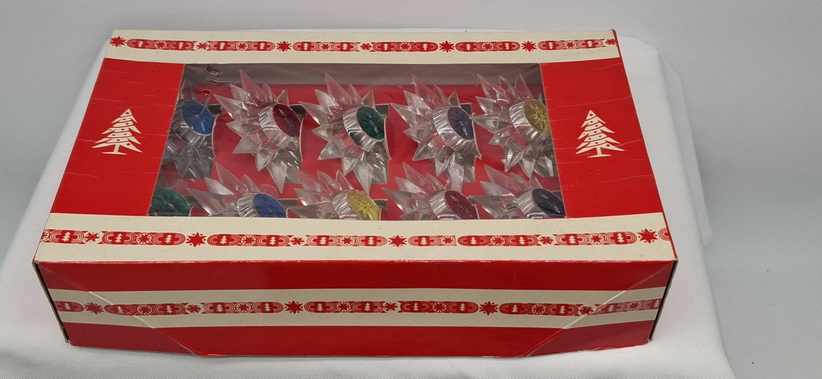 Set of Mid-Century Italian Plastic Christmas Tree Light Covers in Star Form, Circa 1950s–1960s: A charming set of mid-20th-century Christmas tree light covers, expertly molded in Italy and designed in the form of festive stars with colorful translucent centers. Created to fit over miniature Chri