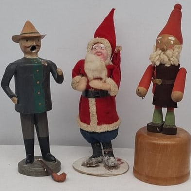 Group of Vintage German Christmas Decorations & Figures, Interwar Period, Including Felt Santa Claus: A charming and authentic grouping of vintage Christmas decorations dating primarily to the interwar period (circa 1920s–1930s), featuring a delightful assortment of holiday figures and ornaments, in