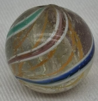 Handmade German Glass Marble, Early 20th Century: A fine handmade German glass marble dating to the early 1900s. This attractive example measures approximately 2 cm (0.8 inches) in diameter and displays the craftsmanship that made German marbles high