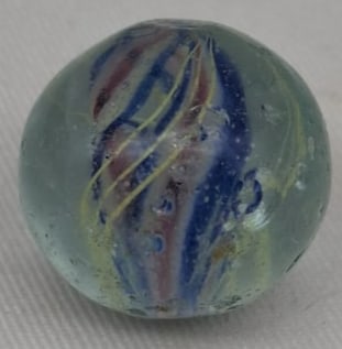 Large Handmade German Glass Marble, Early 20th Century: A fine handmade German glass marble dating to the early 1900s. This attractive example measures approximately 2.4 cm (.95 inches) in diameter and displays the craftsmanship that made German marbles hi