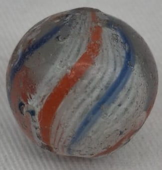 Handmade German Glass Marble, Early 20th Century: A fine handmade German glass marble dating to the early 1900s. This attractive example measures approximately 2 cm (.78 inches) in diameter and displays the craftsmanship that made German marbles high