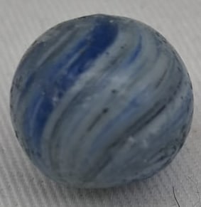 Handmade German Glass Marble, Early 20th Century: A fine handmade German glass marble dating to the early 1900s. This attractive example measures approximately 1.5 cm (.6 inches) in diameter and displays the craftsmanship that made German marbles hig
