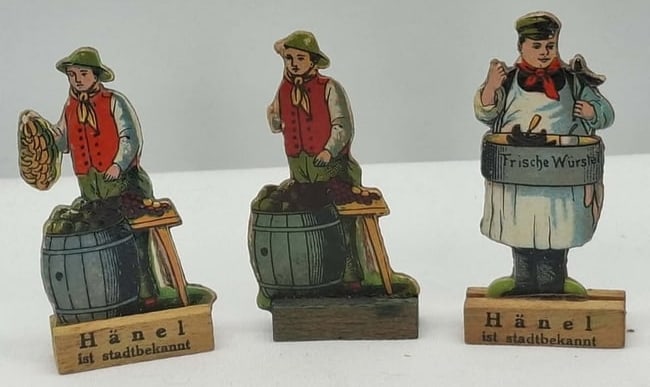 Embossed Cardboard Merchants on Wood Base - Germany: this is a very nice little embossed figure, made in Germany before World War 2, he is about 3 inches tall, these were given away by retail stores in Germany for Christmas and Easter.
