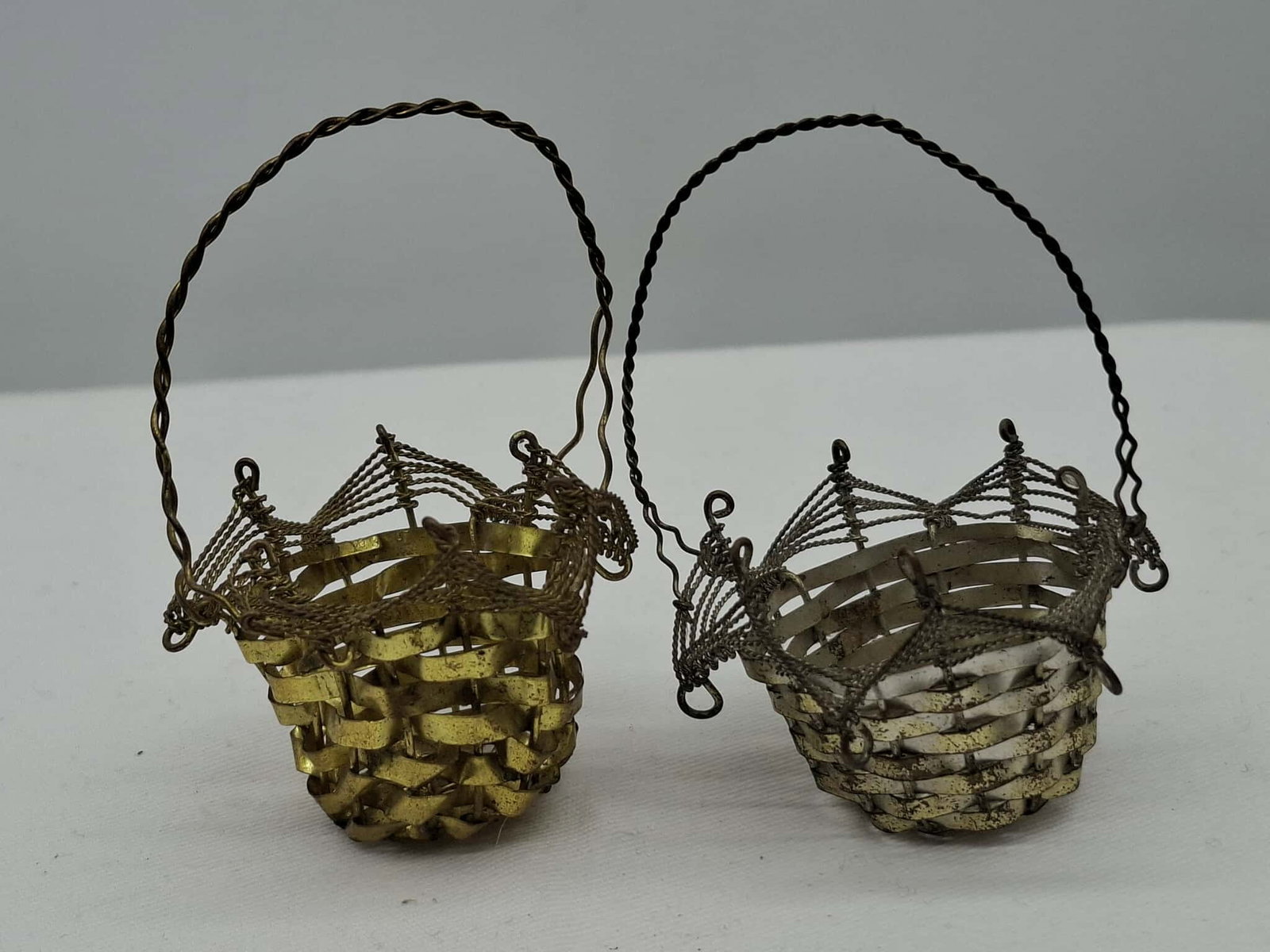 Victorian Feather Tree Ornaments ~ Wire Candy Baskets: Two very cute old German wire basket candy containers, intended to hang on a feather tree, about 2 1/2 inches tall