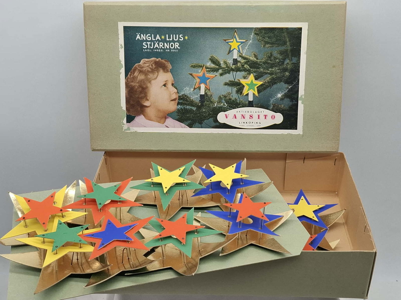 Star Christmas Tree Light Covers: this is a very neat old set of 16-star light covers to go on your Christmas tree, made of cardboard they slide over your Christmas light bulbs, made in Sweeden