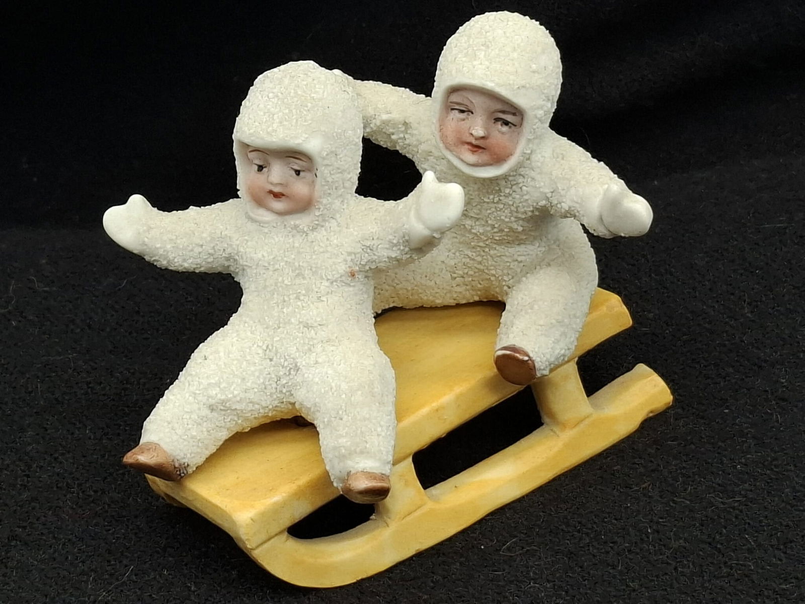 Snowbaby on Sled: This is a very difficult Snowbaby to find, it is about 3 1/2 inches
