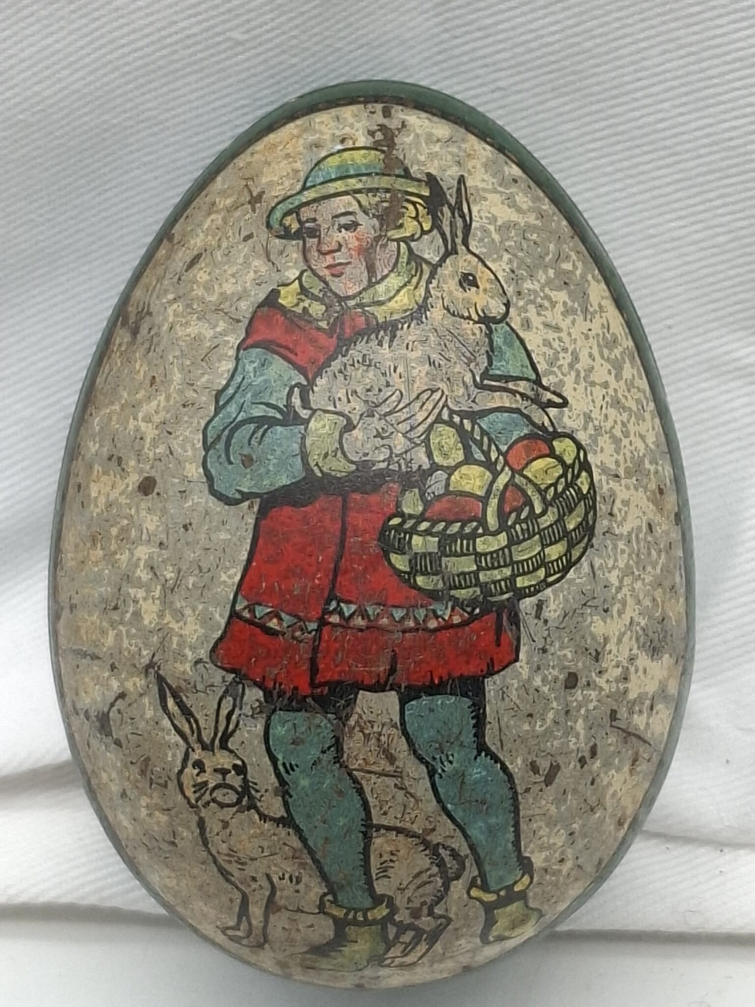 Tin Easter Egg Candy Container: a beautiful old, lithographed tin Easter Egg, it is about 2 1/2 inches