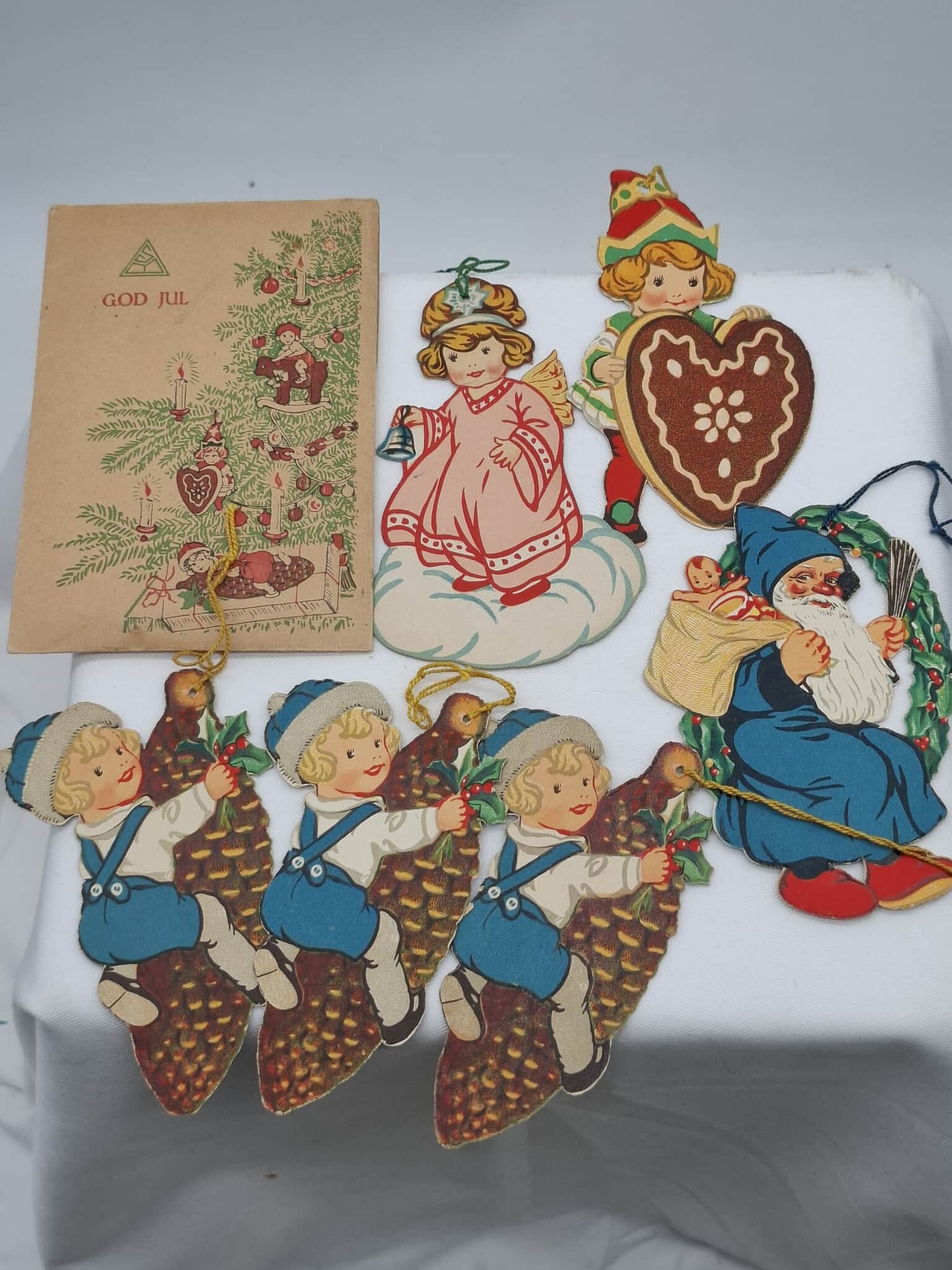 Double sided Paper Christmas Tree Ornaments: this is a very neat set of old paper Christmas tree ornaments, they are in their original envelope,