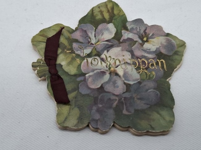 1890 Poetry Book: this is a charming little die cut book of poetry,