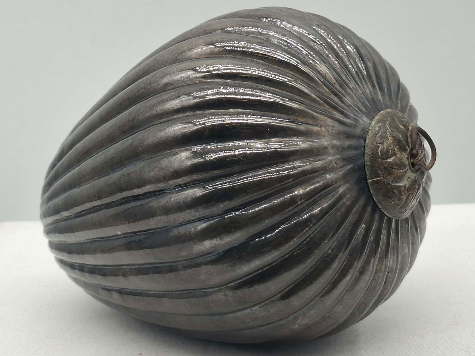 Rare Kugel: This is a most unusual color on a rare form; I feel that this is colored glass and didn't start life as silver. I have never seen a silvered ornament. mirror or "Mercury Glass" item of any type that h