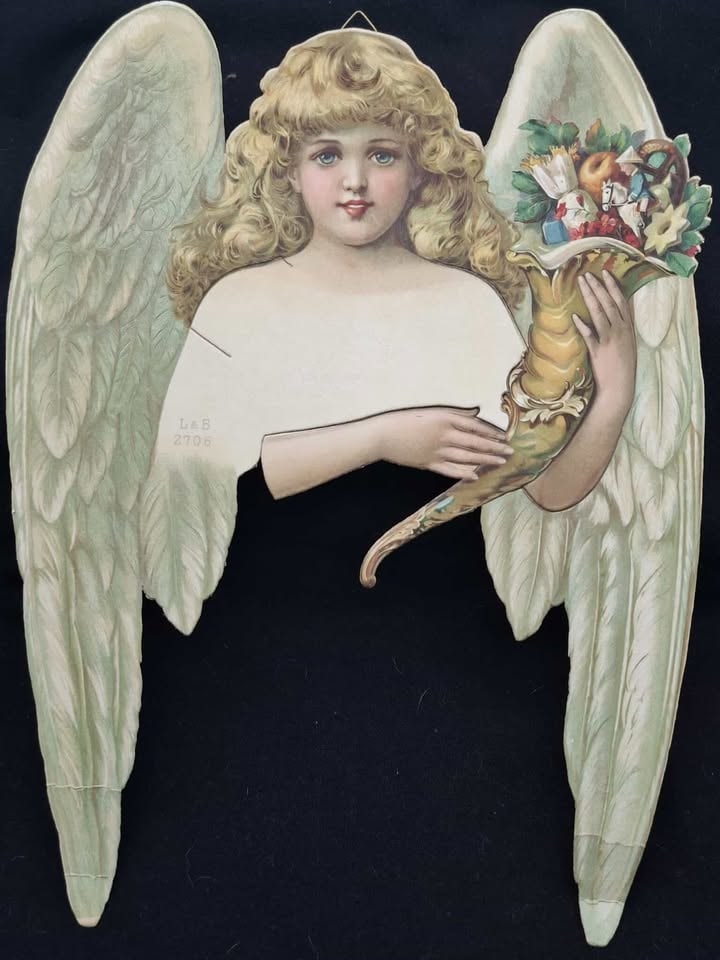 Early Die Cut Angel ~ 12 Inches: this is a beautiful old German die cut angel, she is designed to have a Crepe or Cotton Skirt added so she can be used as a treetop, she is Stunning.