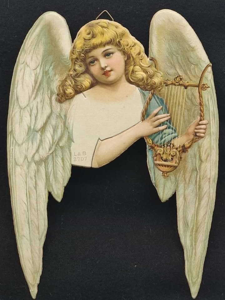 Early Die Cut Angel ~ 9 Inches: this is a beautiful old German die cut angel, she is designed to have a Crepe or Cotton Skirt added so she can be used as a treetop, she is Stunning.