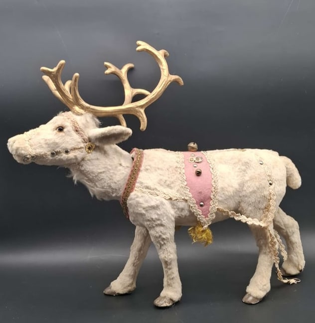 Large Clockwork Reindeer Nodder ~ Papier Mache: Large old papier mache Deer, in working condition, when fully wound he will nod for over 3 hours. clockwork wind up movement, key is included, about 22 inches long and 20 inches to top of antlers, som