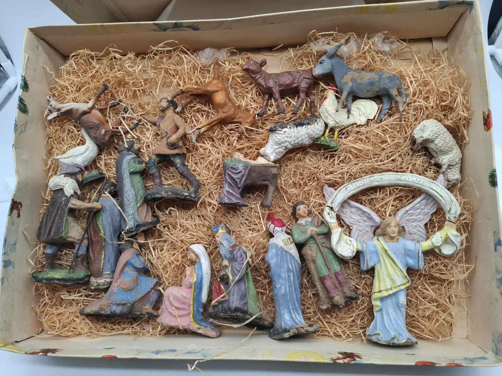 Antique Papier Mache Nativity: a lovey old papier mache nativity set, an Amazing Angel with this set, figures are about 6 inches, some damage on the animal legs, but it displays well