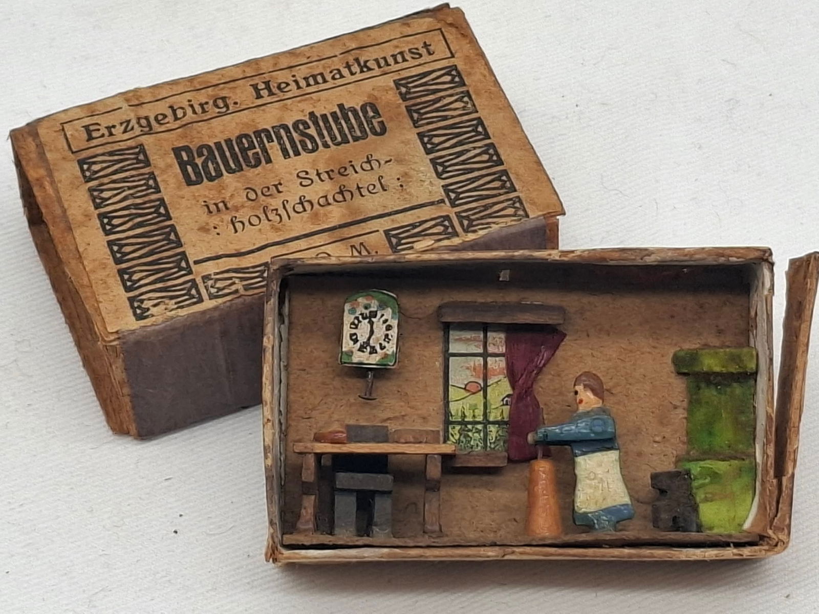 Erzgebirge Matchbox Room Scene: Interesting little slide box with a kitchen inside, figures are made of wood, about 1 x 2 x 1/2 inch