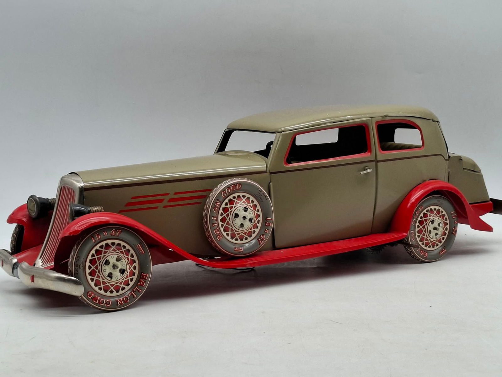 Limousine Toy ~ Battery op Lights: A large, impressive toy, well lithographed with good color, it displays well, about 18 inches long, opening doors, electric lights