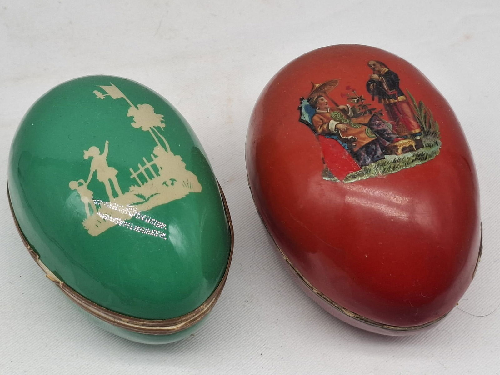 German Egg Candy Containers: a very nice pair of German egg candy containers, these date to the early 1900s, very well made, about 3 1/2 inches