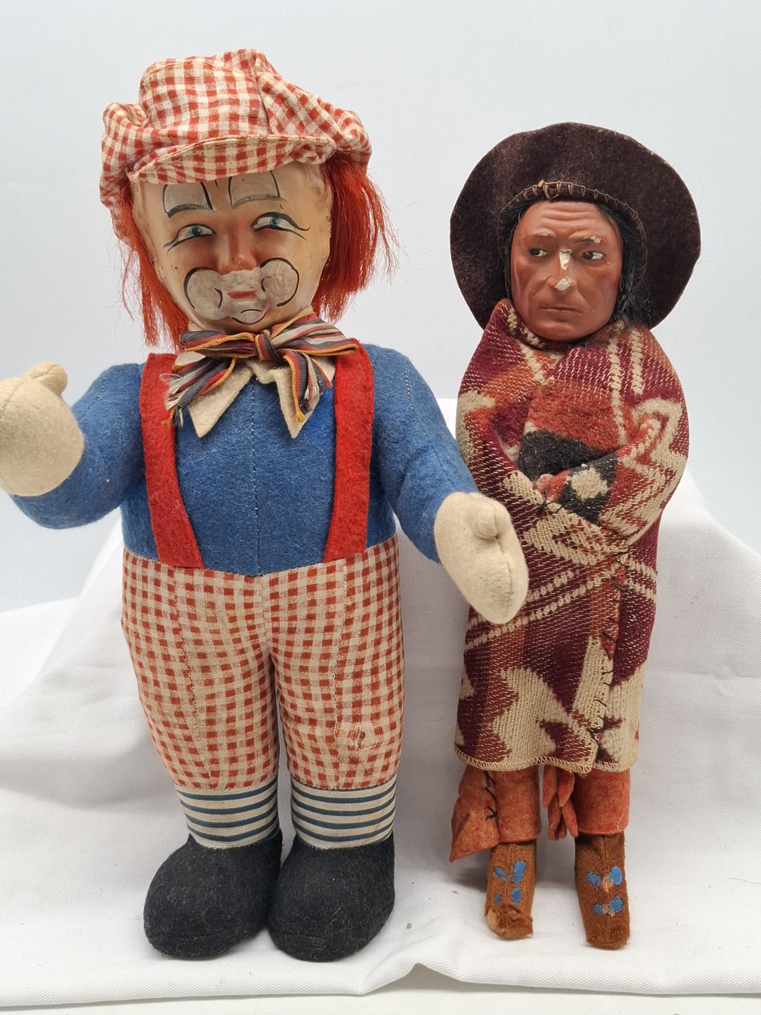 Old Skookum and Clown Dolls ~ Papier Mache: 2 nice old dolls, a skookum and a clown, some paint loss see photos about 11 inches tall