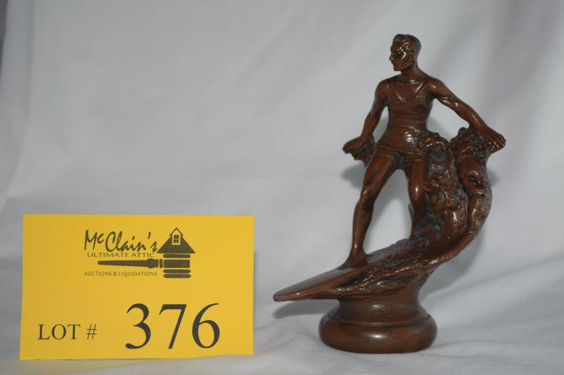 DUKE KAHANAMOKU CAST SURFRIDER TROPHY ORNAMENT, 1930'S: DUKE KAHANAMOKU CAST BRONZE PATINATED "SURFRIDER" TROPHY/HOOD ORNAMENT, DESIGNED BY JOHN KELLY & SCULPTED BY KATHERINE KELLY, 1930'S *
