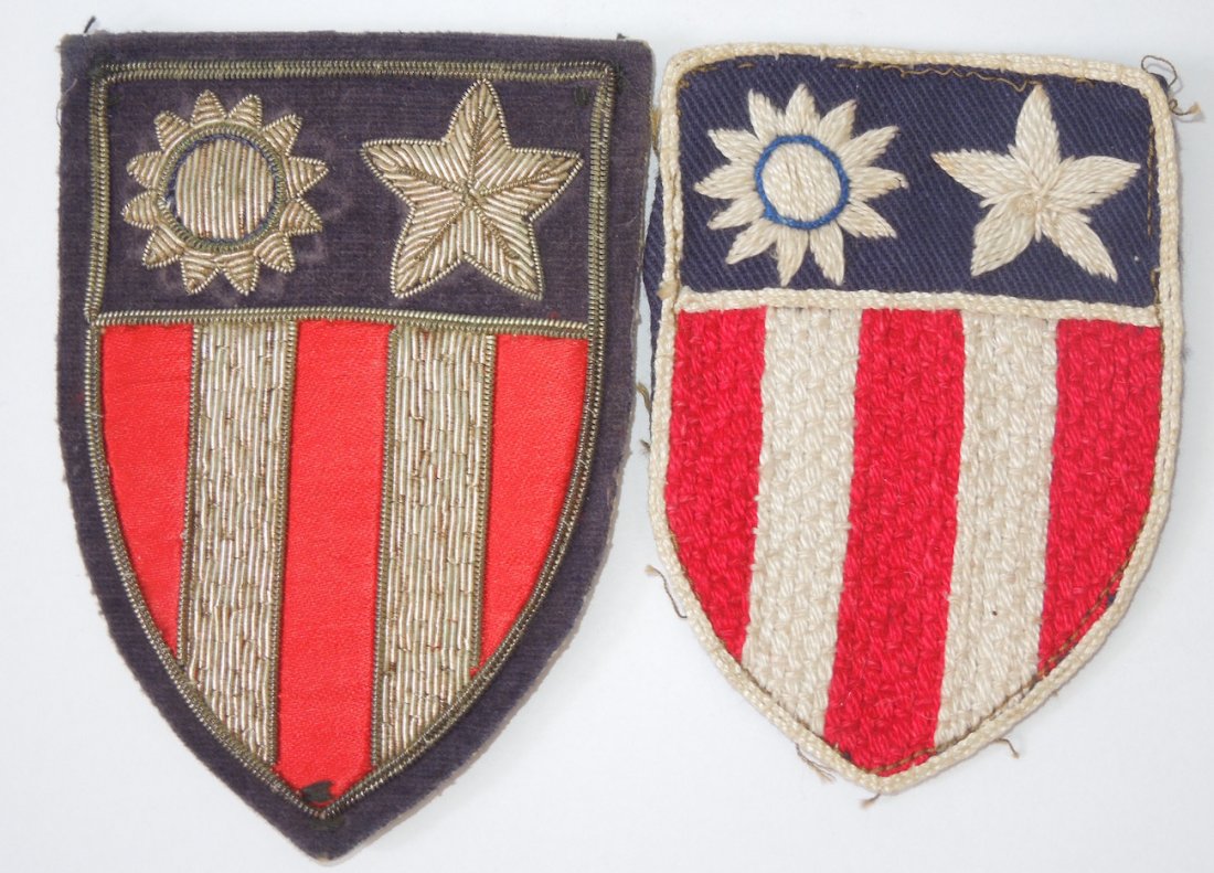 Lot of 2 WWII China Burma India Patches Bullion: Lot of two original WWII CBI theater made patches. One on bullion with snaps, and the other hand embroidered.