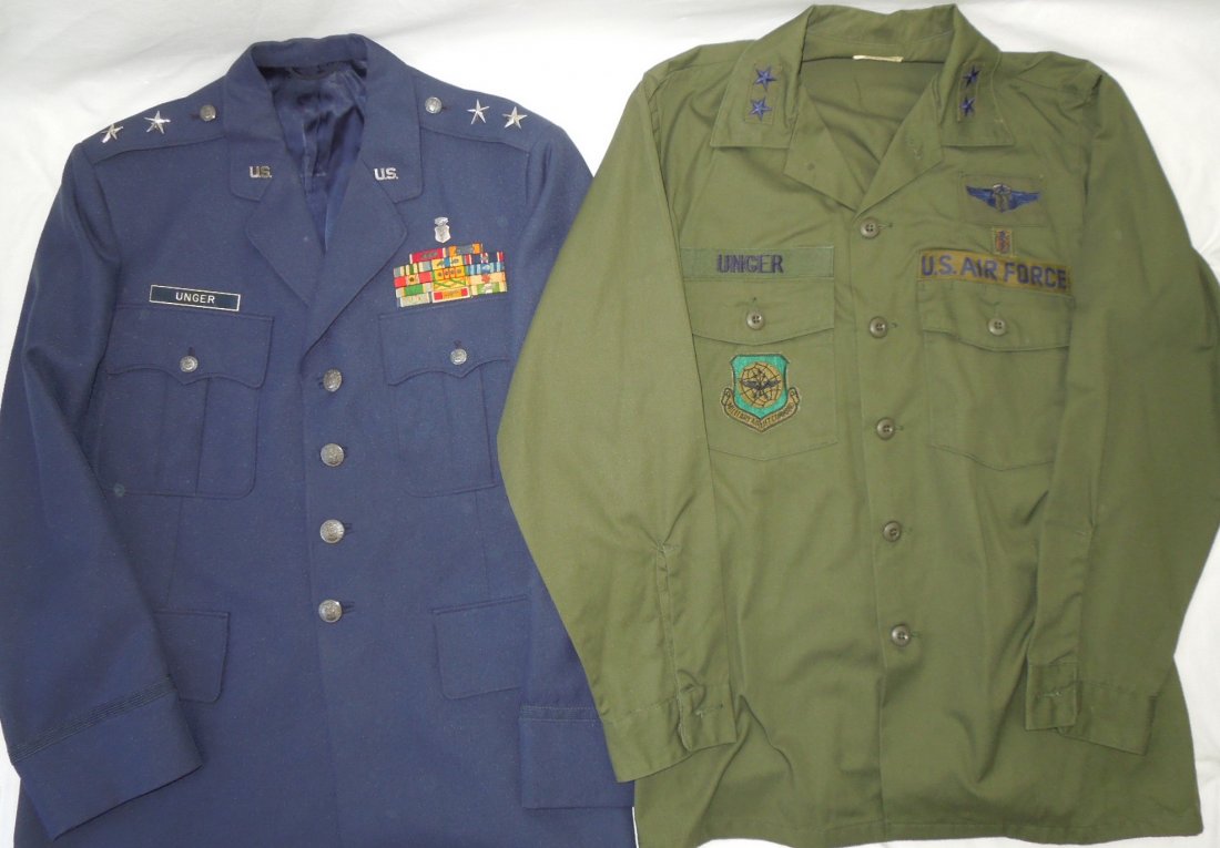 USAF Flight Surgeon Major General Uniforms: Pair of uniforms and pants to Major General (Dr.) Unger. Includes dress blue uniform with original ribbons, stars, pins, etc. and fatigue uniform with patches. Major General (Dr.) Howard R. Unger is c