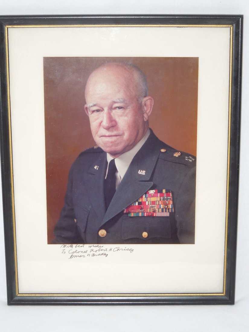 Framed 5 Star Army General Omar Bradley Signed Photo: Framed 5 Star Army General Omar N. Bradley Signed Photograph. Inscribed on the photo: With best wishes, To Colonel Robert H. Chrissy (?) Omar N. Bradley. Frame Size: 11 1/2 x 14 1/2 inches.