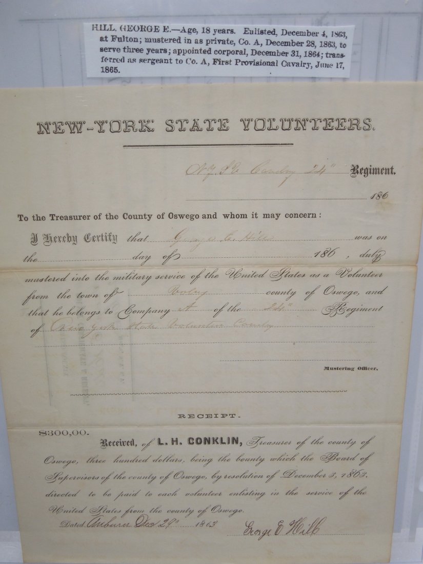 1863 New York Volunteer 24th Cavalry Certificate: Original Civil War bounty certificate with some research named to Sgt. George E. Hill of Fulton, New York, Oswego County who enlisted in 1863 with the 24th New York Cavalry and by War's end was with t