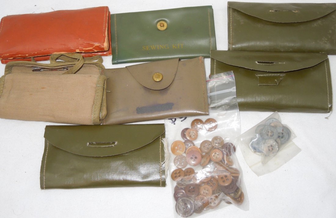WWII Era Sewing Kits, Buttons and Needles Lot #2: WWII Era Sewing Kits, Buttons and Needles Lot. You will receive 7 sewing kits. One kit is named 'C.D. Baxter'. Some kits have various items such as thread, needles, buttons, and scissors. You will als