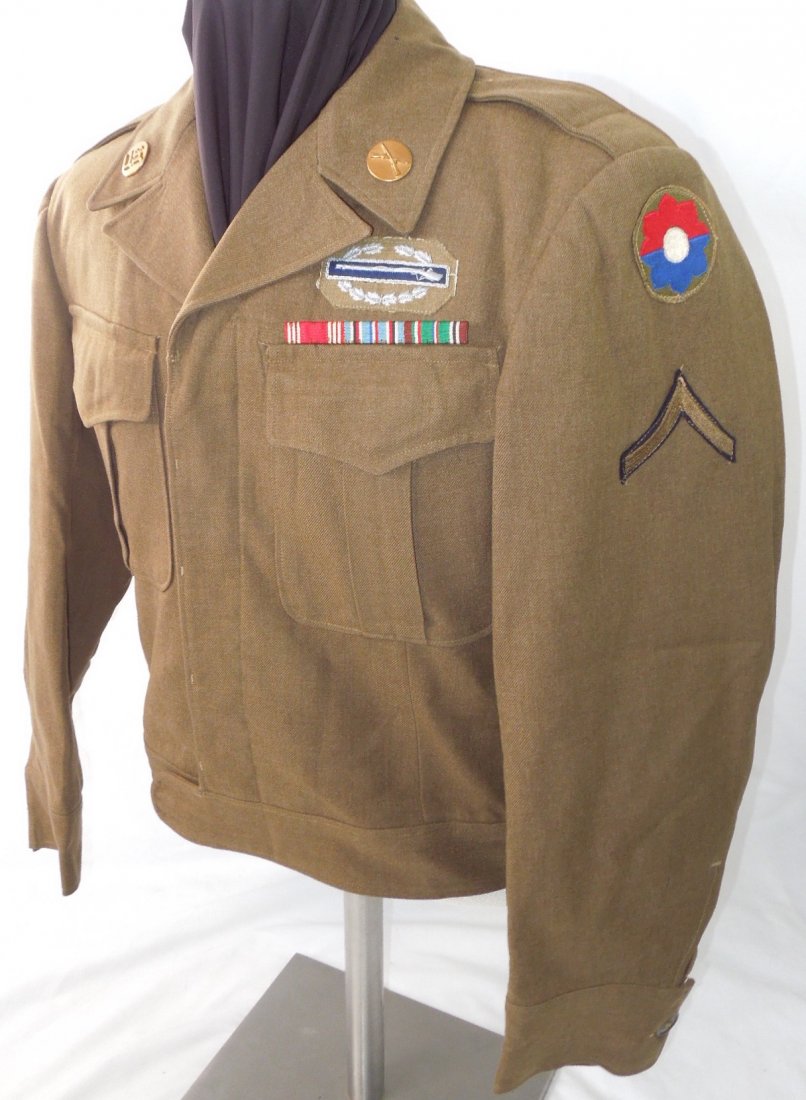 WWII US 9th Infantry Div. US Army Bullion CIB Uniform: WWII US Army 9th Infantry Division Ike jacket with a very nice German occupation made bullion Combat Infantry Badge and a pin back British made ribbon bar. Not named but had a laundry mark of B-9355 i