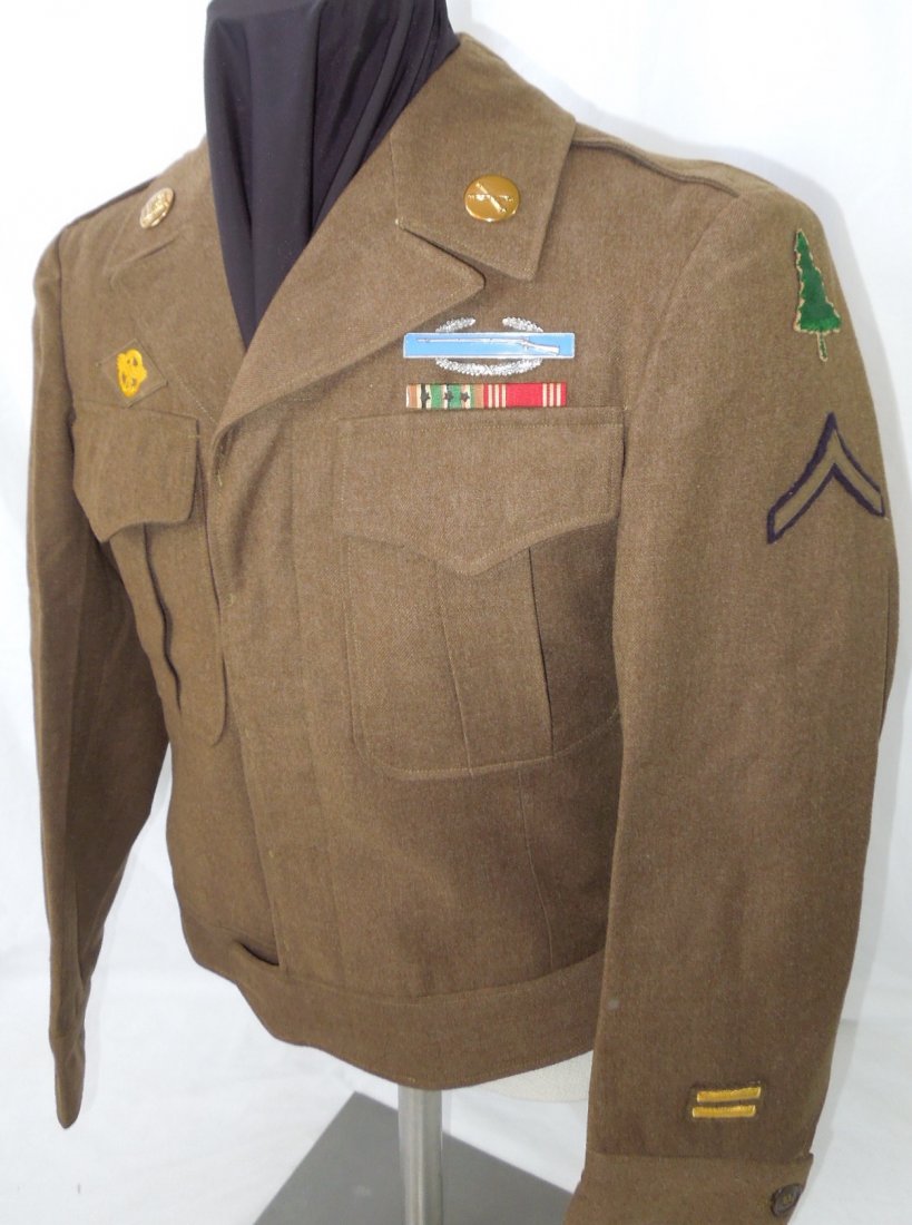 WWII 91st Infantry Div. Pfc. Uniform Jacket CIB US Army: WWII 91st Infantry Division Ike jacket featuring a sterling clutch back Combat Infantry Badge, Good Conduct and European African Middle Eastern Campaign ribbons, and other insignia as shown. Not named