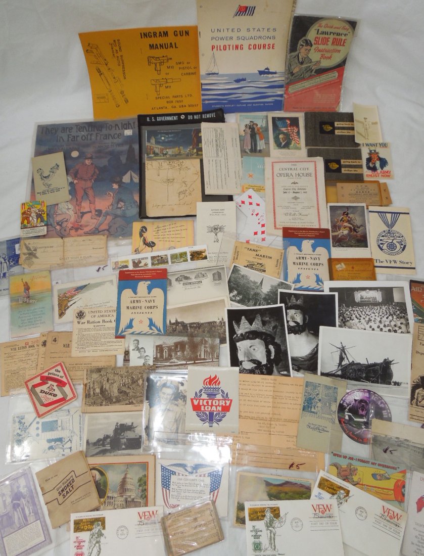 Military Booklets PC Photos Home Front Ephemera Lot: Military Booklets, Post Cards, Photos, Home Front, Ephemera plus more lot. Some of the items include the following: 1940 Uncle Sam Army I Want You Sticker, 1944 War Bonds Calendar, 1945 Victory Loan S