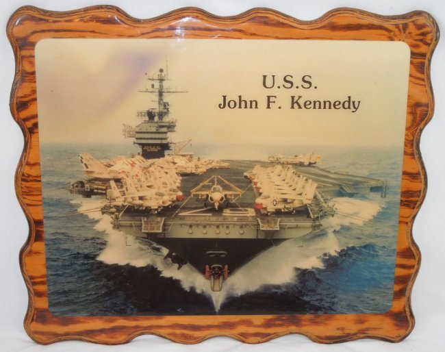 USS John F. Kennedy Aircraft Carrier Large Wood Photo: USN Navy USS John F. Kennedy Aircraft Carrier Photo on Wood. Size: 19.5 x 23 inches. A great photo matted on the wood with a clear gloss. USS John F. Kennedy (CV-67) (formerly CVA-67) is the only ship