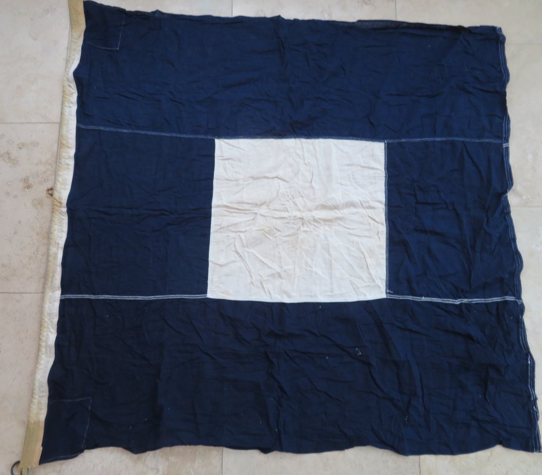 Maritime Nautical Flag Papa "P" About To Sail: Maritime Nautical Flag Papa "P" About To Sail. Vintage Cotton Navy Maritime Ship's Signal Flag. Design is sewn with rope and brass hardware. This flag is used and has the look of having been out in th