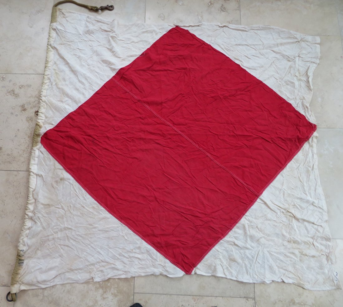 Maritime Nautical Flag Foxtrot "F" Disabled: Maritime Nautical Flag Foxtrot "F" Disabled. Vintage Cotton Navy Maritime Ship's Signal Flag. Design is sewn with rope and brass hardware. This flag is used and has the look of having been out in the 
