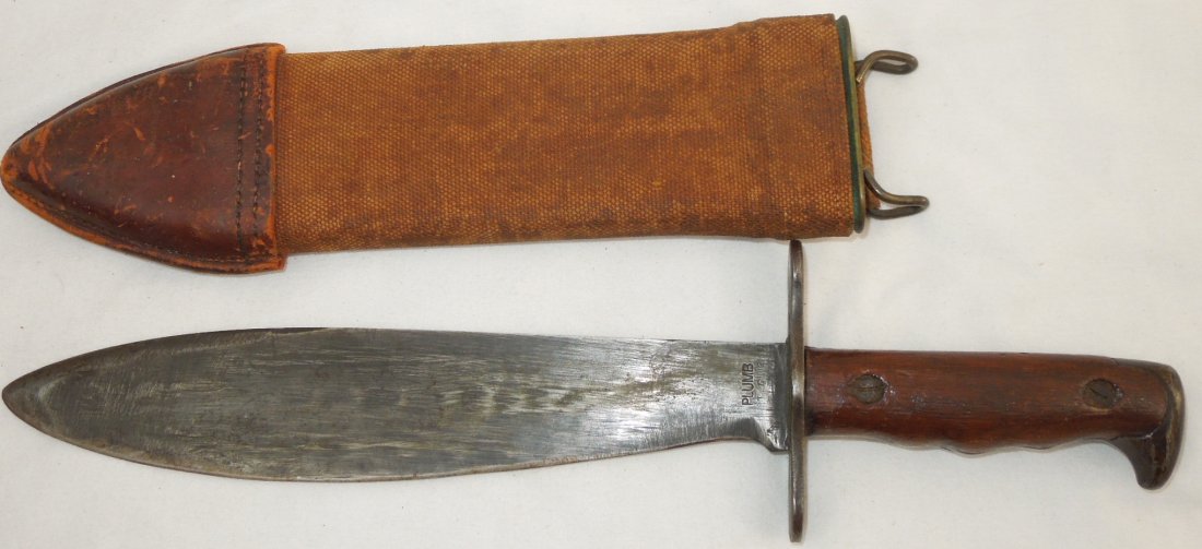 WWI 1917 US Military Plumb Bolo Knife & Scabbard: Original 1917 C.T. US Mod Plumb marked BOLO knife and scabbard. The blade has been sharpened at some point.