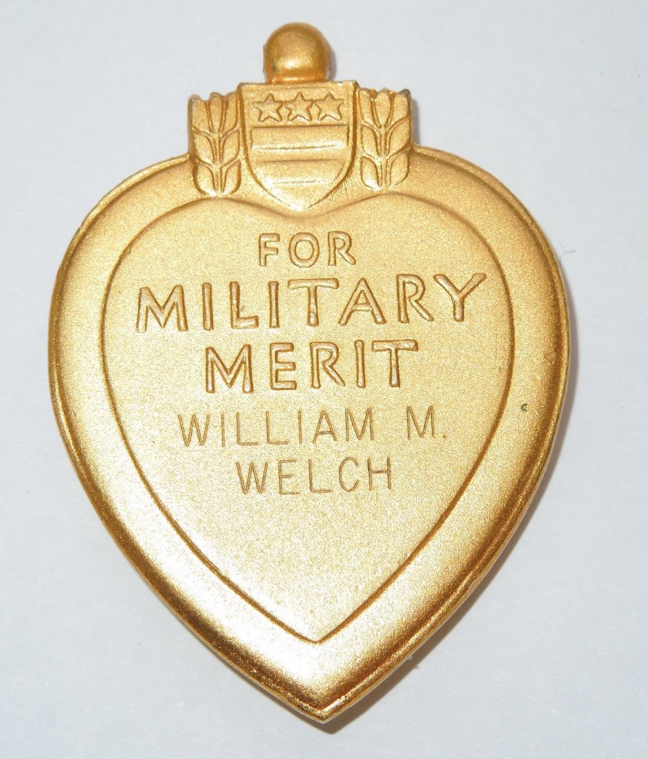 Korean War 7th & 31st Infantry Named Purple Heart Medal: Korean War engraved Purple Heart with official US Government engraving to Private First Class William M. Welch, 31st Infantry Regiment, 7th Infantry Division who was seriously wounded in action on Sep