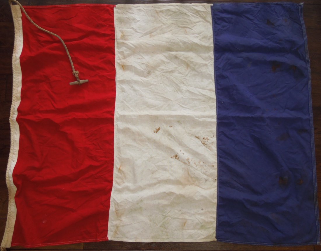 1950s Era French Merchant Marine Vessel Ship Flag: Vintage original French ship flag with the hanger starting on the red instead of the blue side. Measures 53 1/2 inches by 43 1/2 inches.